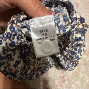 Size 80. Fits like 12 months. Bubble floral. Long sleeve. Used condition.